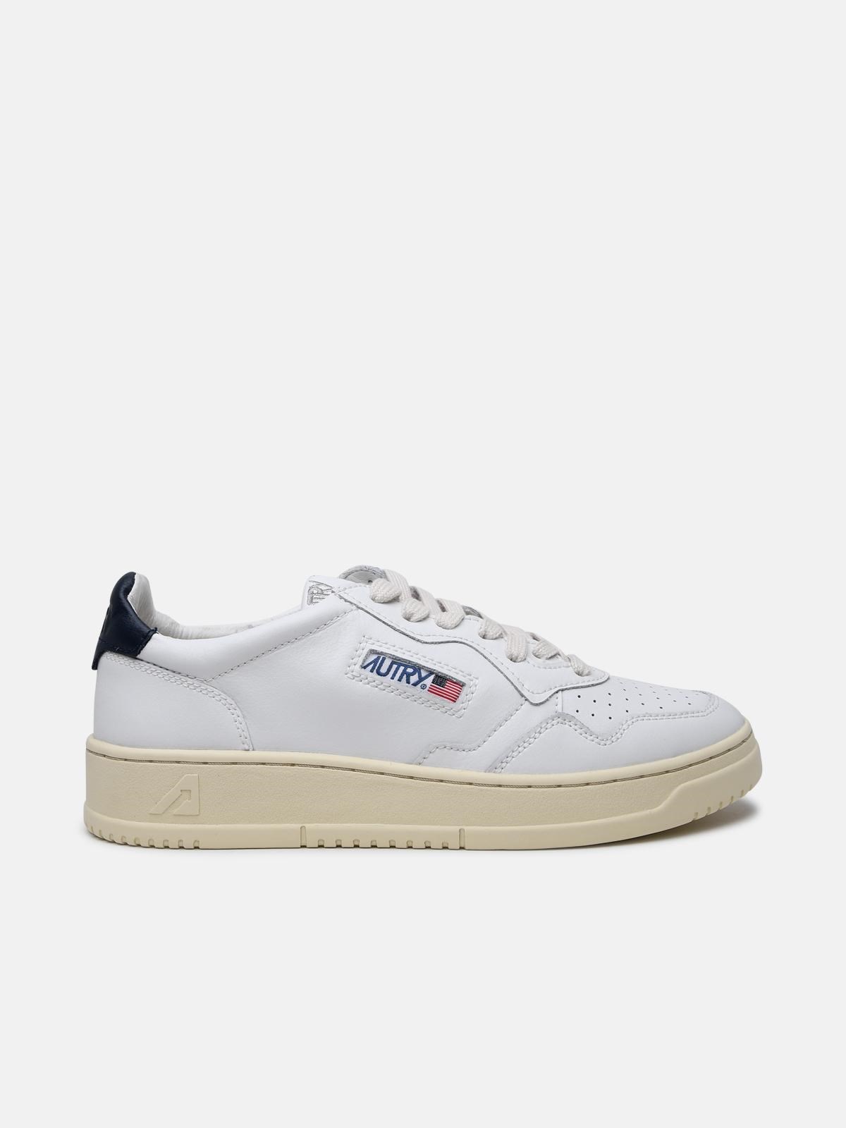 Shop Autry Sneaker Tall. In White